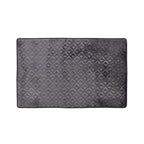 Ebony bathmat featuring a soft geometric textured pattern on a clean white background.