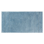 Pale blue striped bath runner with soft textured pile on a white background.