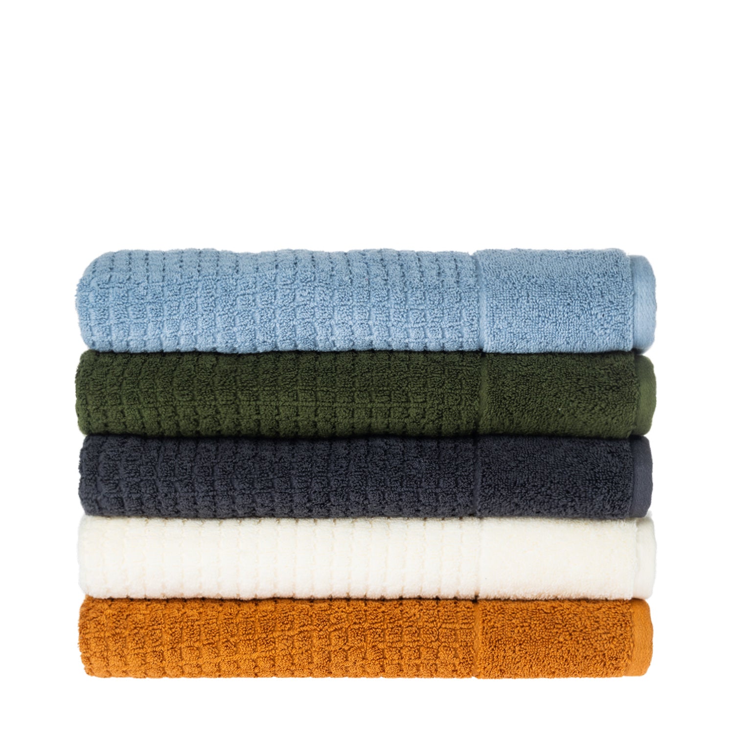 Stack of Fieldcrest Marney textured towels in blue, green, charcoal, ivory, and caramel on a white background.