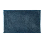 Faded blue bathmat featuring a soft quick-dry textured finish on a clean white background.