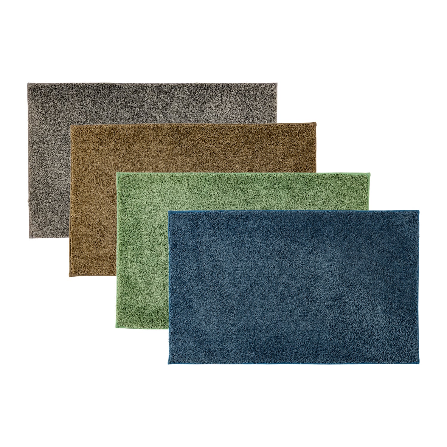 Bathmat range featuring soft quick-dry textured finishes in silver, natural, pear, and faded blue colourways on a clean white background.