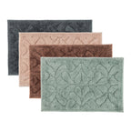 Rectangular bath mats available in Blush, Charcoal, Chocolate, and Khaki.