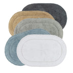 Plush oval bath mats available in White, Denim, Silver, Taupe, and Charcoal.