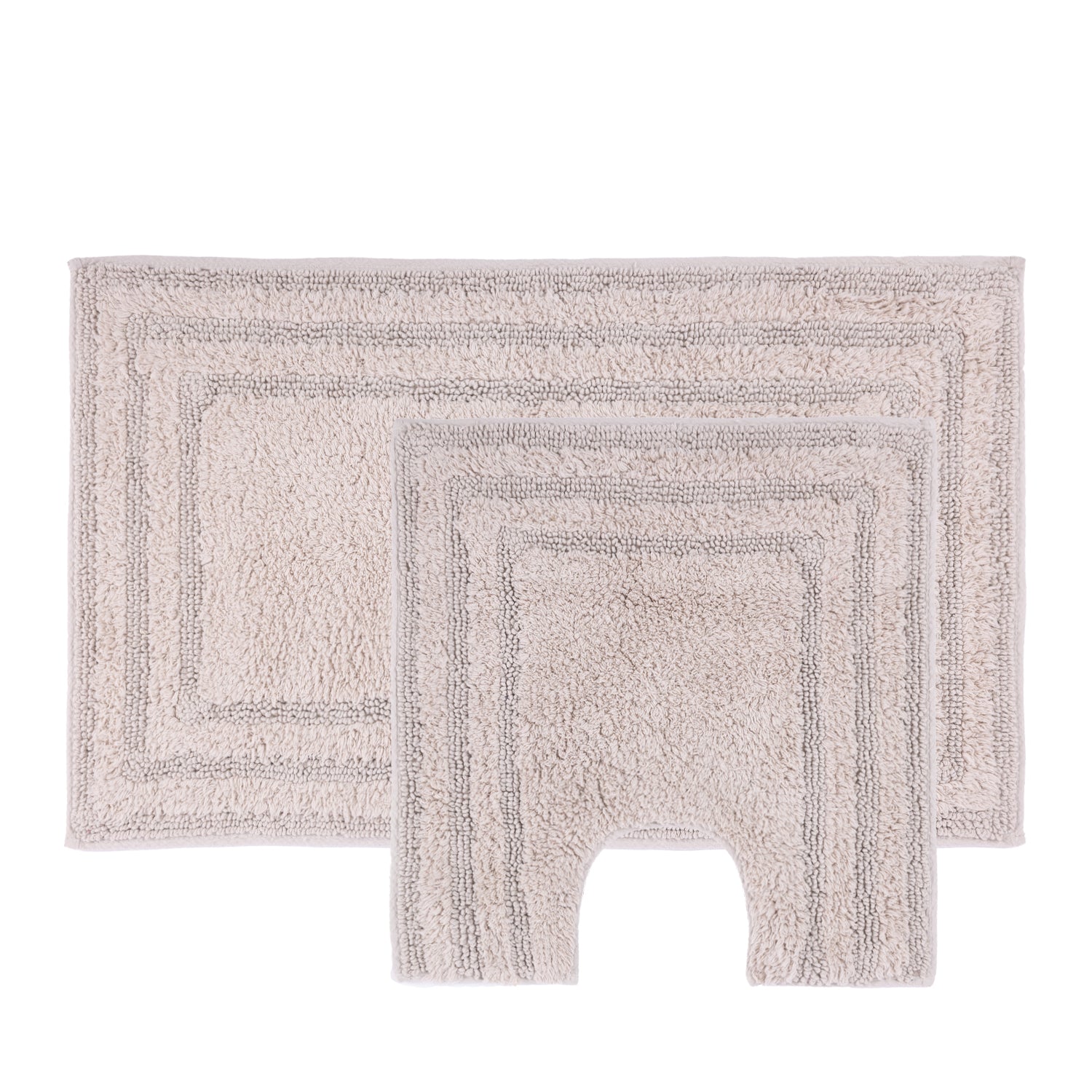 Taupe two-piece bath mat and contour mat set with a soft textured pile and bordered design.