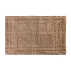 Beige Fieldcrest Jenna Self Check tufted bath mat with a textured geometric pattern on a white background.