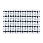 A white textured bobble bathmat featuring alternating rows of ebony black and light grey diamond patterns against a plain white background.