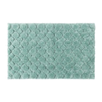 Solace Pebble Bathmat in Eucalyptus with a plush raised pebble-inspired texture on a white background.