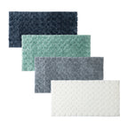 Solace Pebble Runner range displayed in Ebony, Eucalyptus, Grey and Cream with a soft raised pebble-inspired texture.