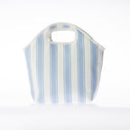 A striped print lunch bag with a top handle, shown on a clean white background.