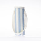 A stripe print bottle bag with a white strap stands against a white background.
