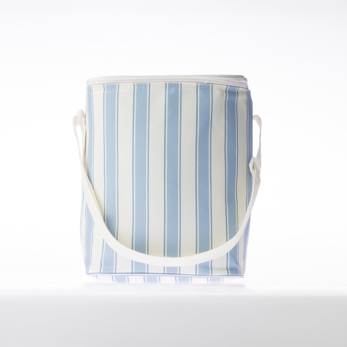 A stripe print cooler duffle bag with a white strap stands against a white background.
