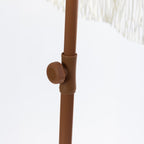 Close-up of the brown umbrella pole showing the adjustable locking knob.