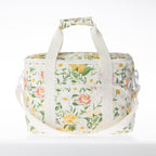 A floral print lunch bag with a handles, shown on a clean white background.