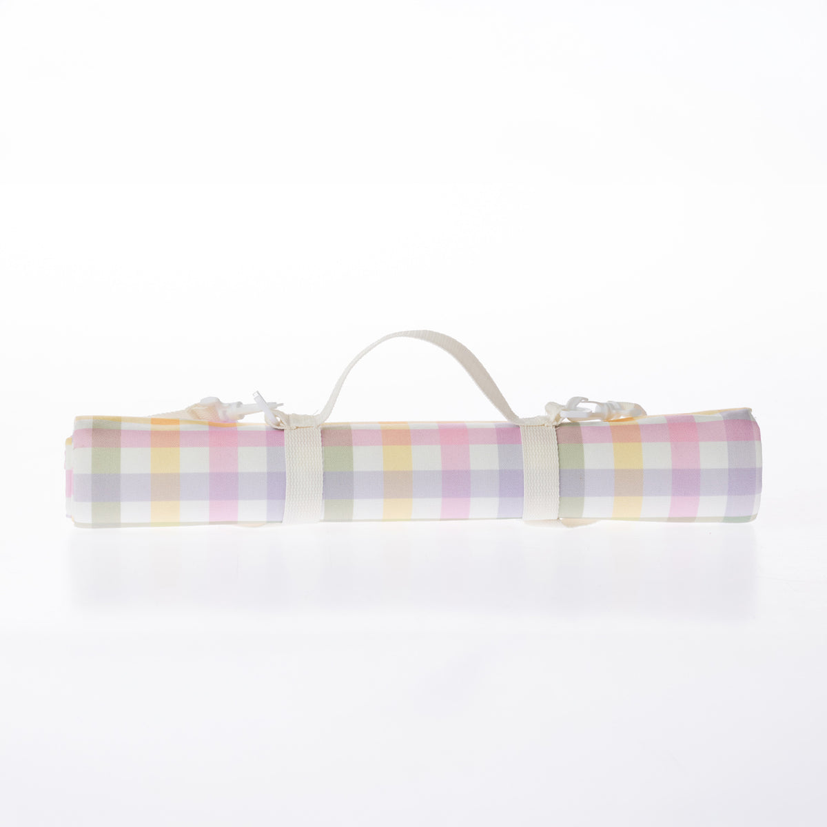 A rolled-up picnic mat on a white background.