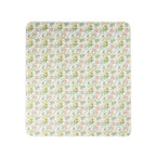 A flat lay view of a printed picnic mat