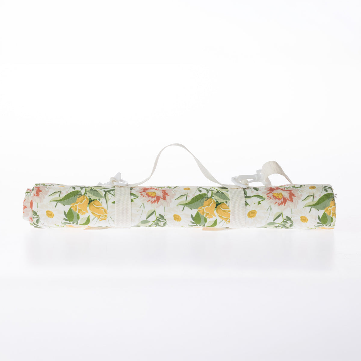 A rolled-up picnic mat on a white background.