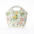 A floral print lunch bag with a top handle, shown on a clean white background.