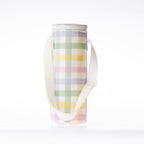 A check print bottle bag with a white strap stands against a white background.