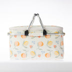 A fruit print cooler bag on a white background.