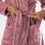 Close-up of the Rose textured plush bathrobe showing the soft fabric, shawl collar, self-tie belt and spacious front pocket.