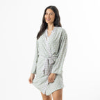 Model wearing the Marlo Contrast Viscose Printed Robe in green, featuring an all-over floral print, long sleeves and a coordinating waist tie.