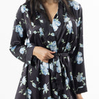 Close-up of the Eden Malibu Satin Printed Robe in Black, highlighting the blue floral print, satin finish and waist tie.