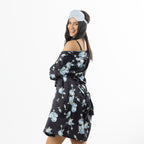 Eden Malibu Satin Printed Robe in Black styled off the shoulder with a pale blue satin eye mask.