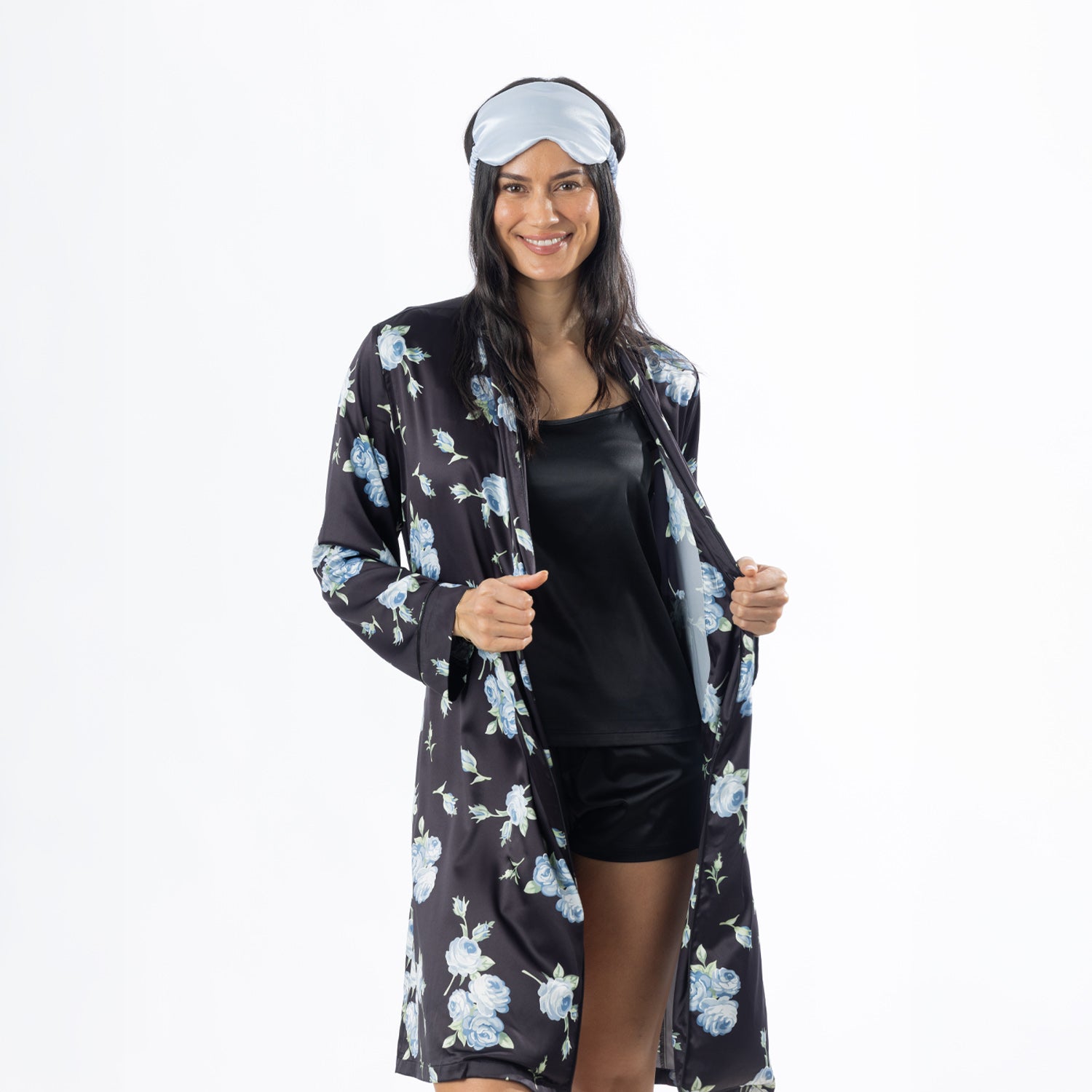 Eden Malibu Satin Printed Robe in Black worn open over matching sleepwear with a pale blue satin eye mask.