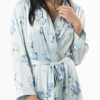 Close-up of the Eden Malibu Satin Printed Robe in Pale Blue, showing the floral print, satin finish and matching waist tie.