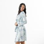 Eden Malibu Satin Printed Robe in Pale Blue shown from the side, highlighting the relaxed fit and floral pattern.