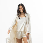 Eden Malibu Satin Robe in Ivory worn open with coordinating ivory satin sleepwear, shown in a full-length front view.