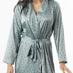 Close-up of the Eden Malibu Satin Printed Robe in Sage, highlighting the small floral print, satin finish, piping and waist tie.