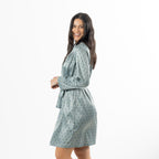 Eden Malibu Satin Printed Robe in Sage shown from the side, highlighting the knee-length cut and relaxed fit.