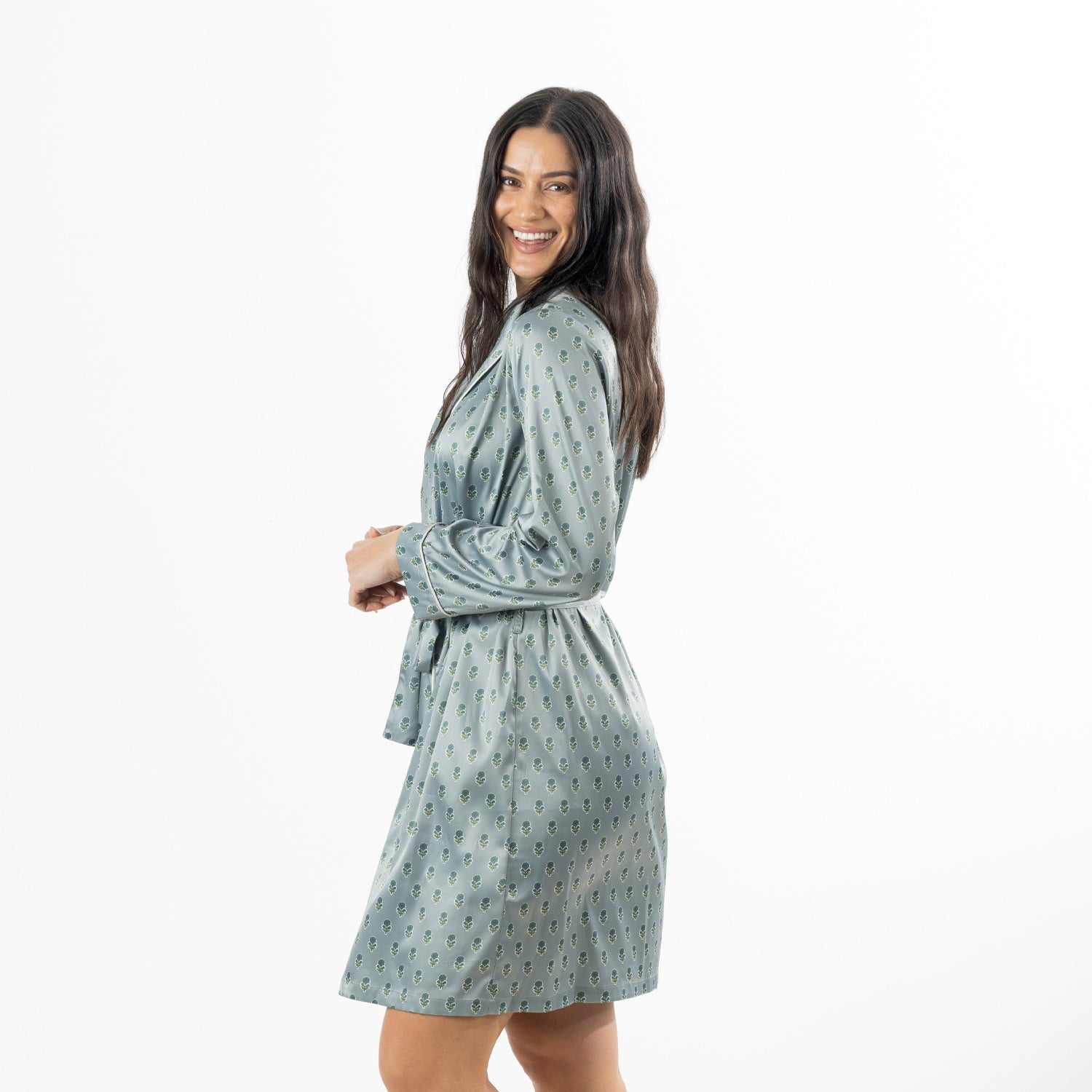 Eden Malibu Satin Printed Robe in Sage shown from the side, highlighting the knee-length cut and relaxed fit.