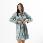 Eden Malibu Satin Printed Robe in Sage shown tied at the waist with its repeating floral motif clearly visible.