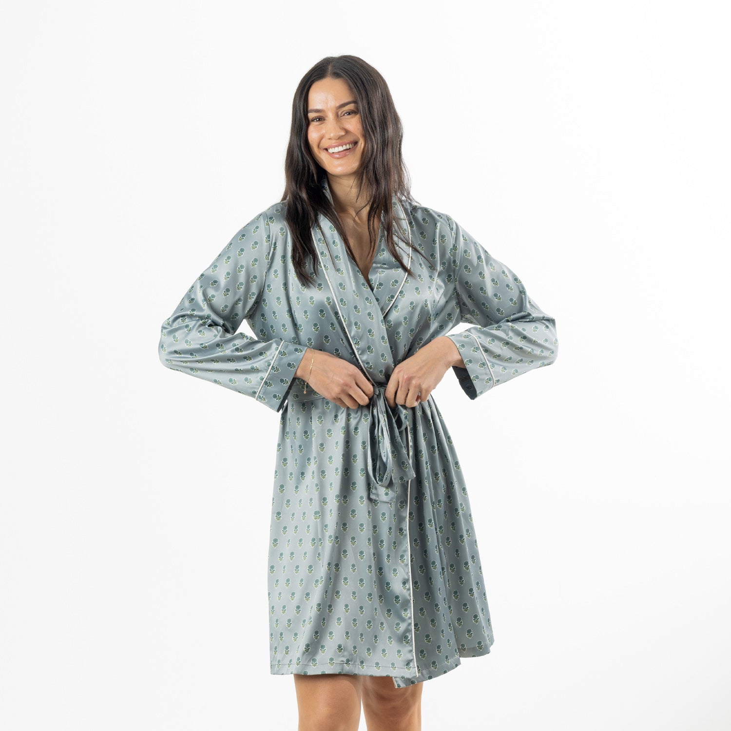 Eden Malibu Satin Printed Robe in Sage shown tied at the waist with its repeating floral motif clearly visible.