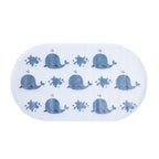 White kids bath mat with blue whale print and suction cups.