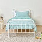 bb&b Kids Gingham seafoam duvet cover set styled on a white metal bed in a neutral bedroom.