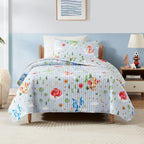 bb&b Kids Dragon coverlet set with colourful dragon print styled on a single bed.