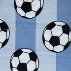 Soccer ball print fabric with black and white footballs on a blue background.