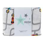 Hush Kids race car flannelette sheet set folded in packaging with race car print and Hush label.
