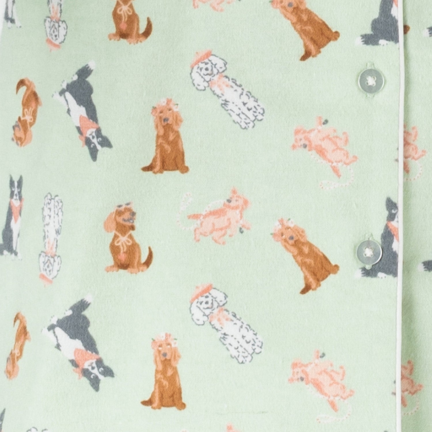 Child wearing bb&b Sleep Kids Dog flannelette pyjama up chlose with buttons