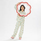 Child wearing bb&b Sleep Kids Dog flannelette pyjama set with a playful all-over print.