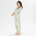 Child wearing bb&b Sleep Kids Dog flannelette pyjama set with a playful all-over print.
