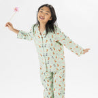 Child wearing bb&b Sleep Kids Dog flannelette pyjama set with a playful all-over print.