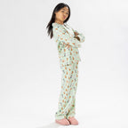 Child wearing bb&b Sleep Kids Dog flannelette pyjama set with a playful all-over print.