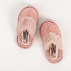 Pink open toe slippers with soft faux fur straps on a white background.