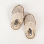 Natural open toe slippers with soft faux fur straps on a white background.