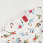 bb&b Sleep Kids Dino Sport knit pyjama fabric close-up with colourful dinosaur and sport print.