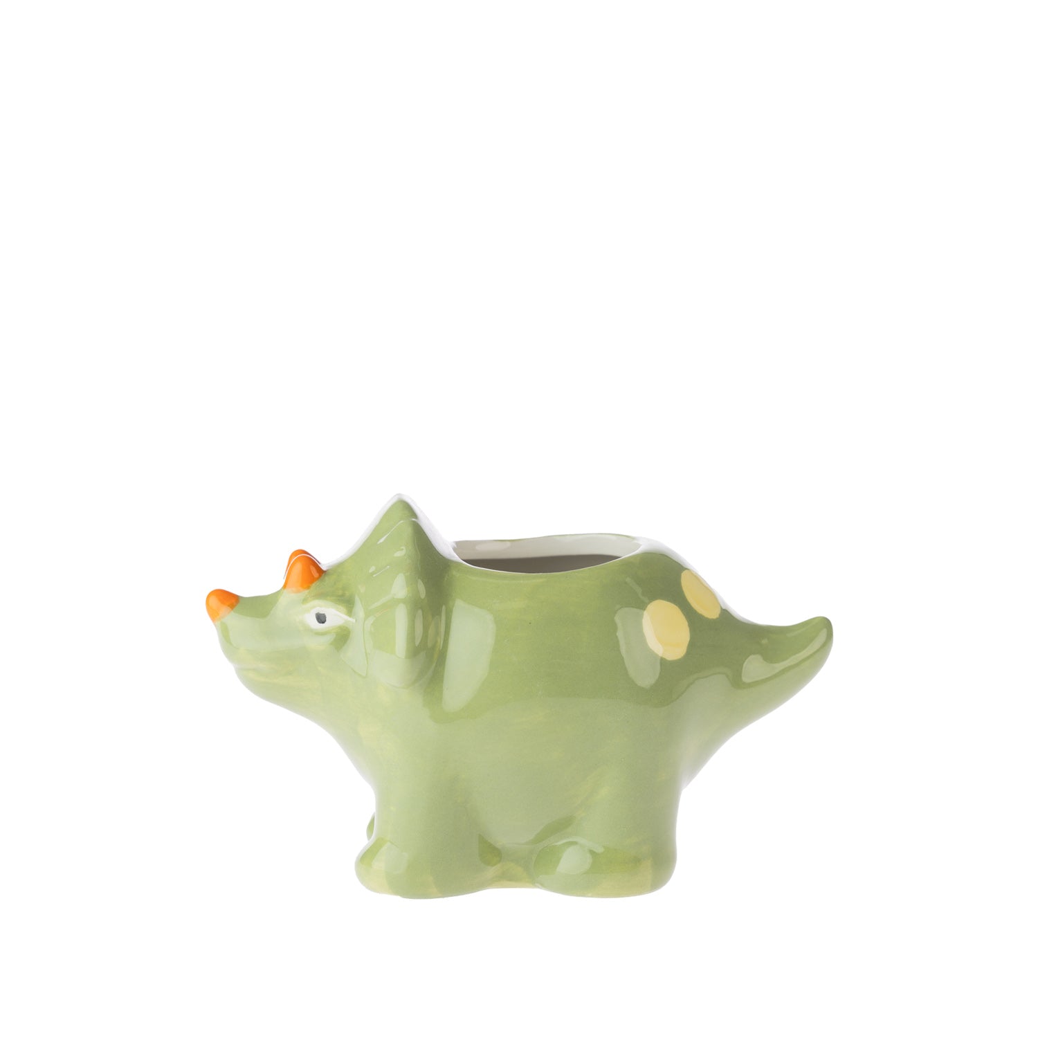 bb&b Kids Dino Toothbrush Holder in Green, featuring a playful dinosaur-shaped ceramic design with orange horns and yellow spot details.